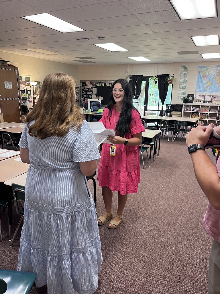 Teacher meeting parent at Open House