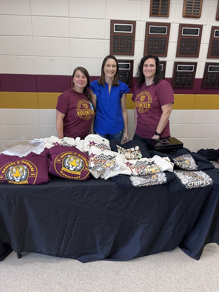 PTO members behind table.