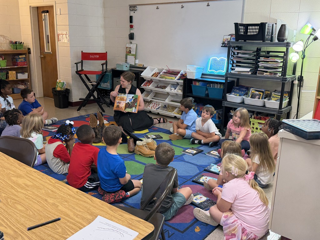 Mrs. Davis reading to students. 
