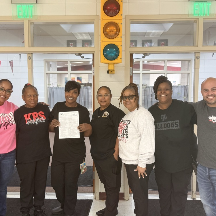 cafeteria staff being recognized for their 100 inspection score 