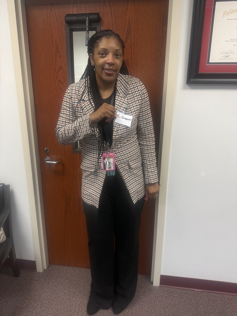 Teaches dress up for Everyday Hero Day as Dr. Chapman!