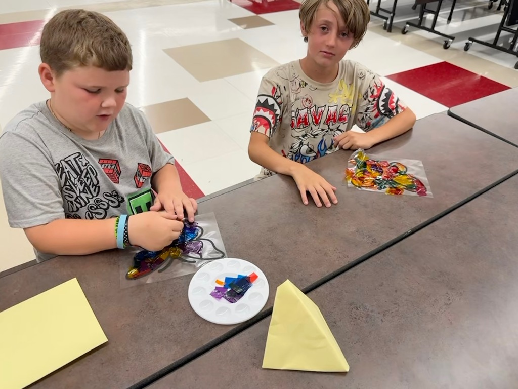 From squishy science with oobleck to decorating bird houses and crafting stained glass butterflies, our summer school students are mixing creativity with learning this summer!