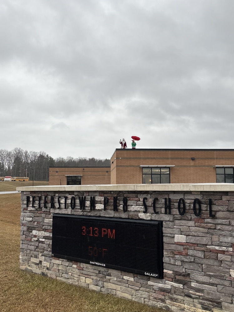 Santa and one of his elf helpers came to see students off for their holiday break at Peterstown PK-8! 
