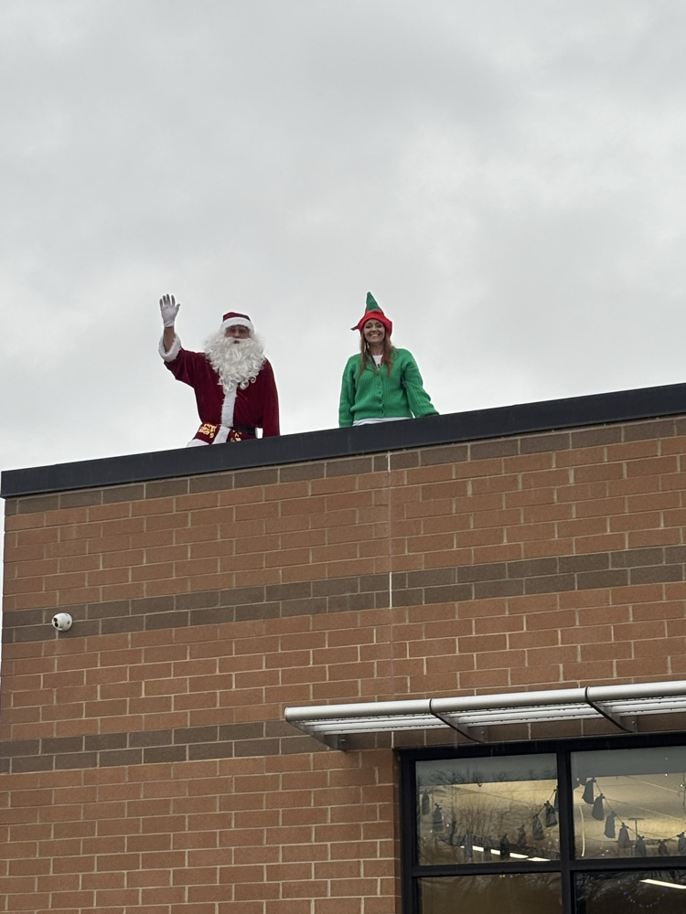 Santa and one of his elf helpers came to see students off for their holiday break at Peterstown PK-8! 