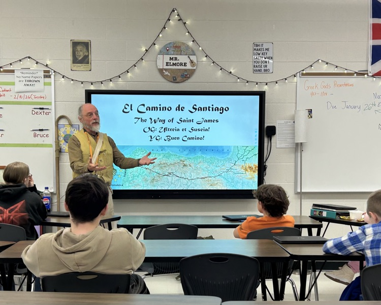 Dr. Womack speaking to students about his journey from France to Spain.