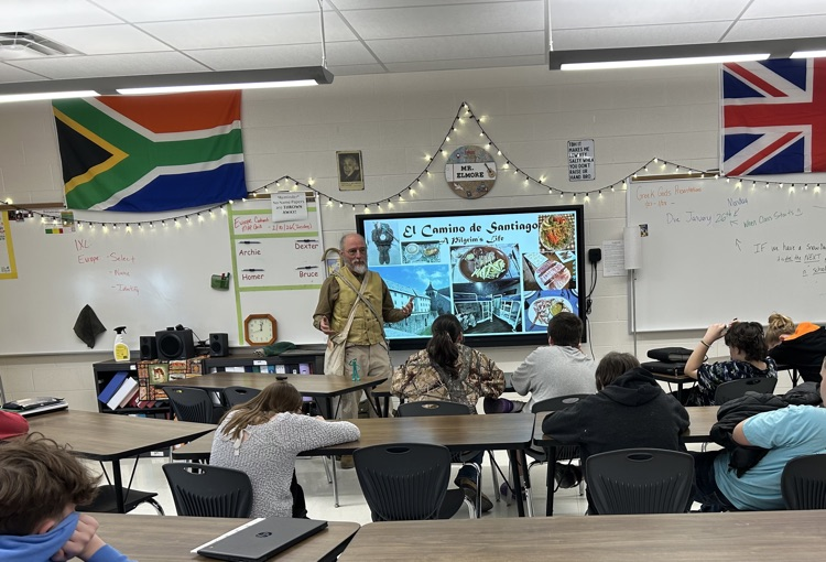 Dr. Womack speaking to students about his journey from France to Spain.