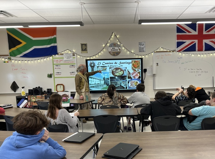 Dr. Womack speaking to students about his journey from France to Spain.