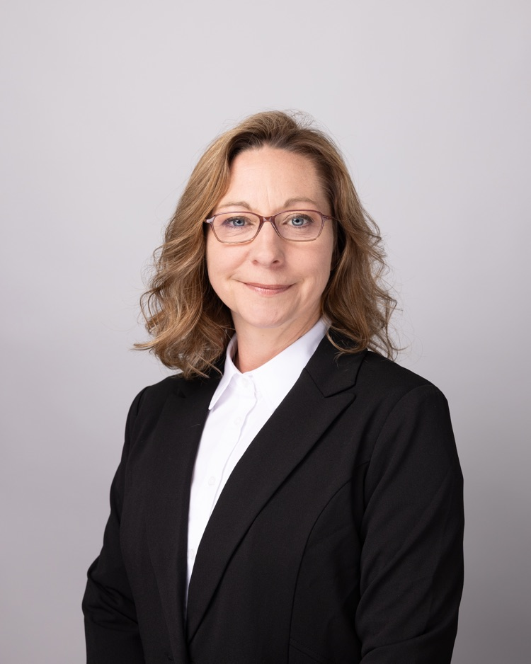 nellie Cottle in a black suit