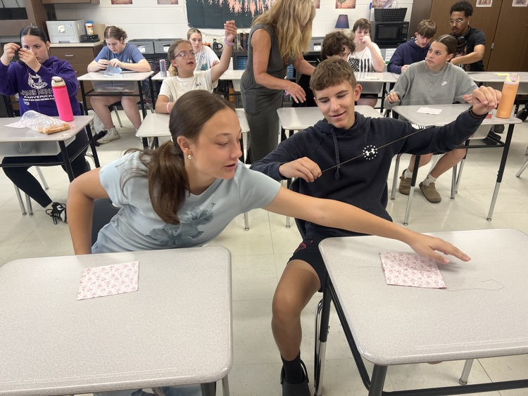 PMS students read The Coffin Quilt and learned to sew. 