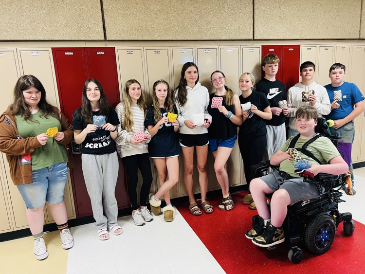PMS students read The Coffin Quilt and learned to sew. 