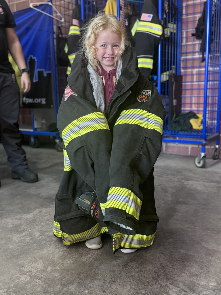 Deciding if the firefighter coats are heavy or light!