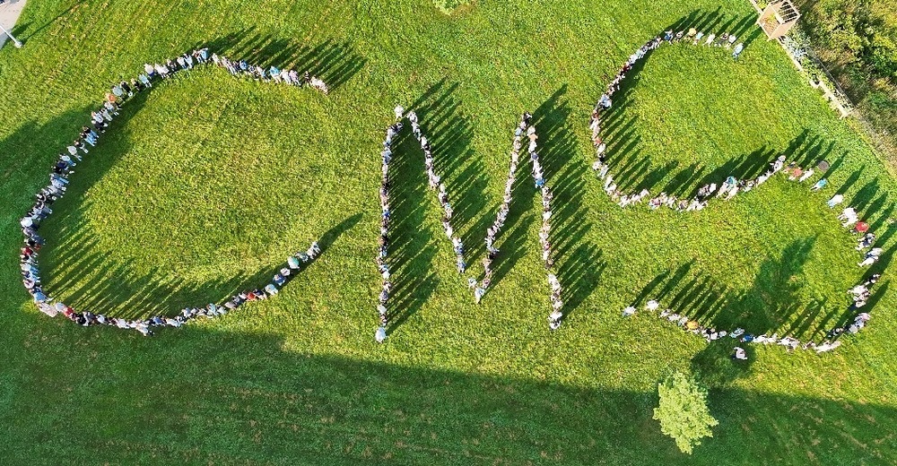 Students at CMS shaping the CMS for a drone photo