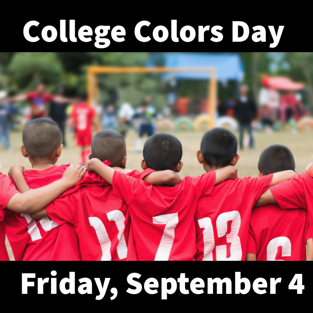 Photo of the backs of 5 school boys on the same soccer team wearing their team color, red. 