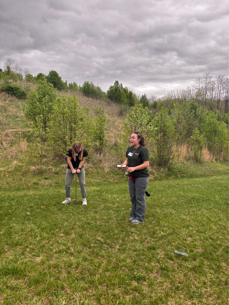 STREAM Team members extracting core from soil
