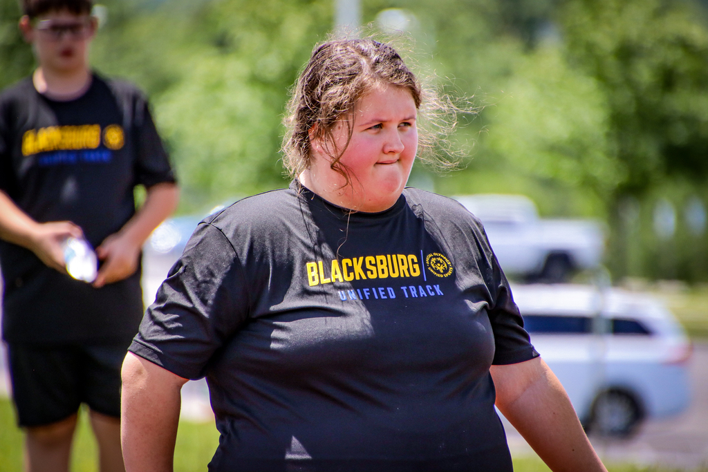 Unified Track member competing