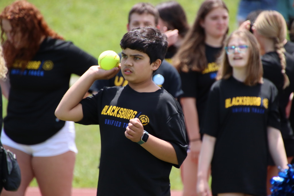Unified athlete competing in the softball toss event