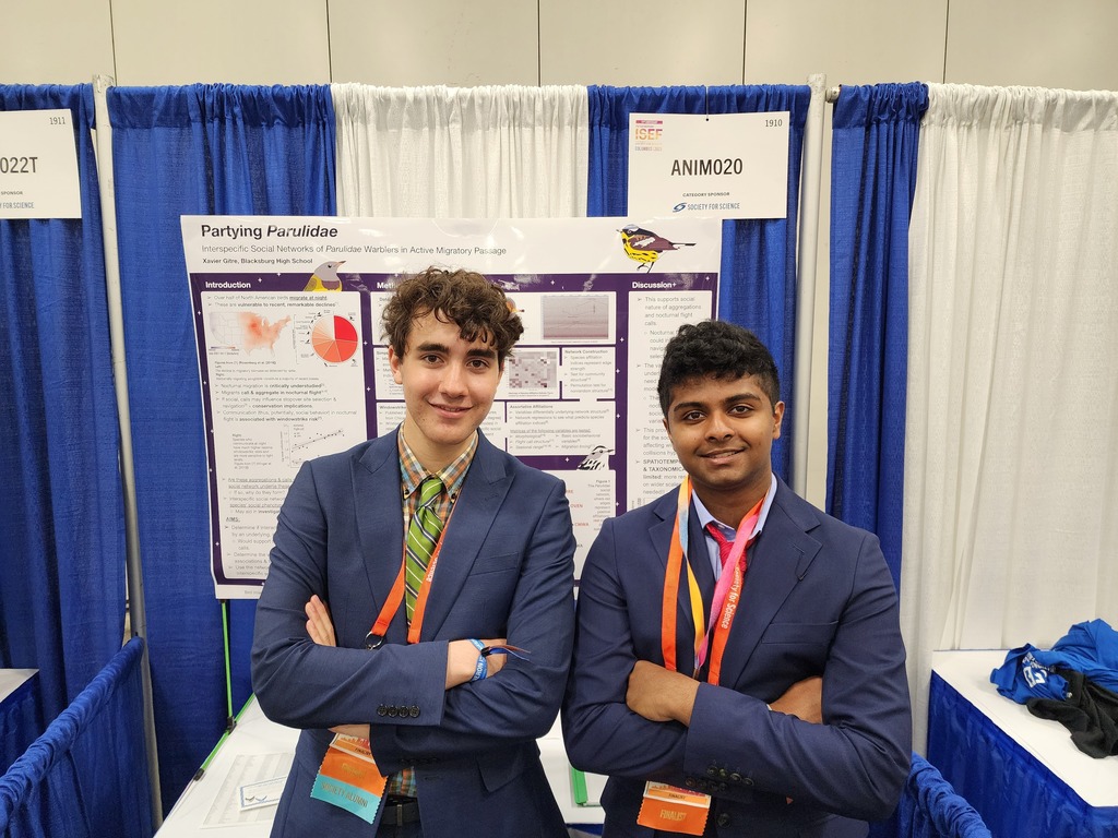 Xavier Gitre and Rishi Nair posing for a photo