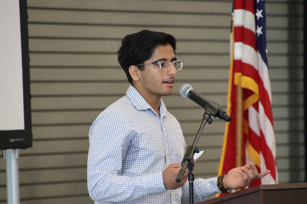 Avi Ghandi speaking at CHS ribbon cutting ceremony