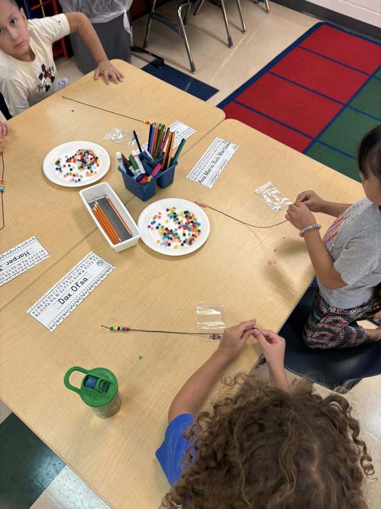 students making bracelets