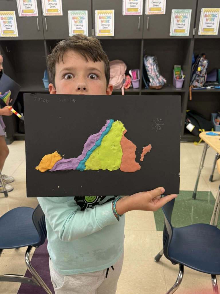 Student with a salt dough map of VA