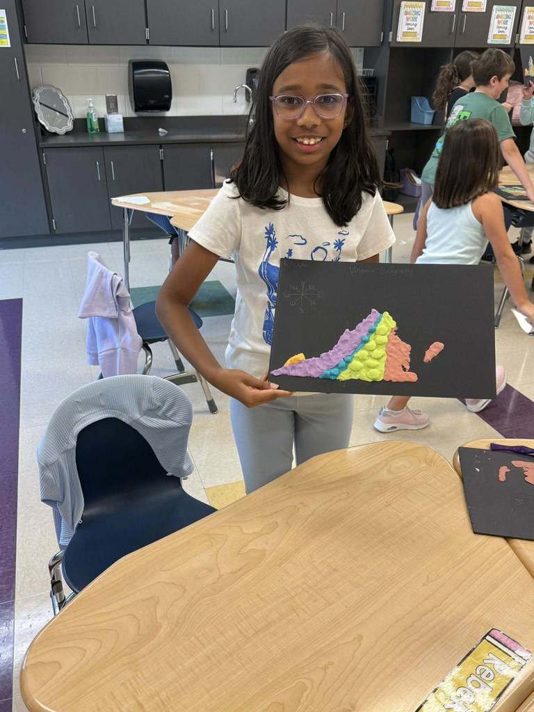 Student with a salt dough map of VA
