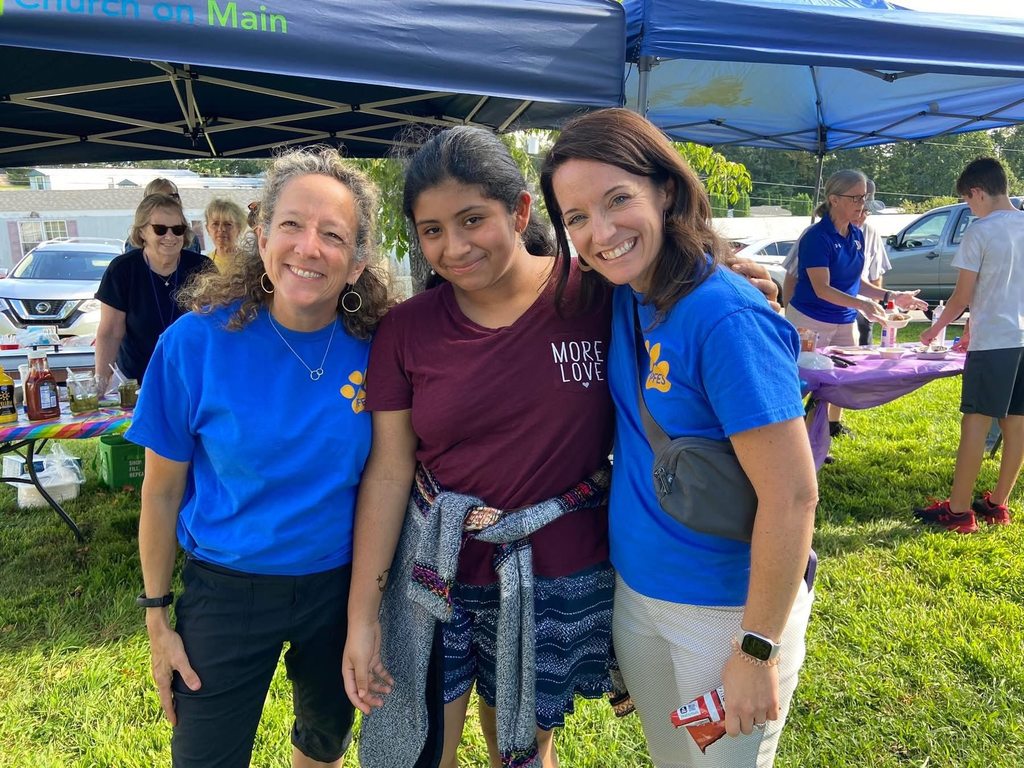 Smiling teachers and students