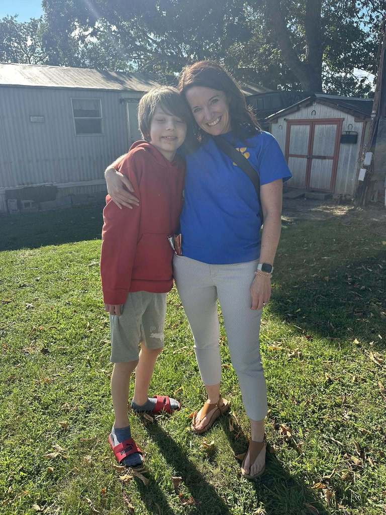 Smiling teachers and students