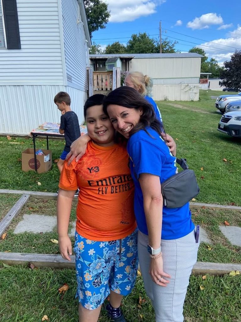 Smiling teachers and students