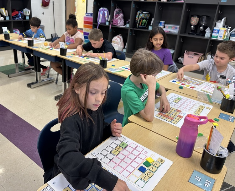 student with reading manipulatives 