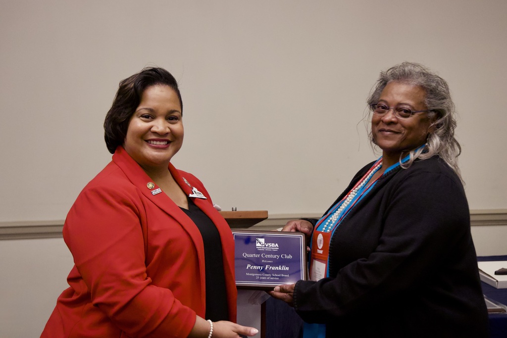 Penny Franklin posing for a photo with another woman. 