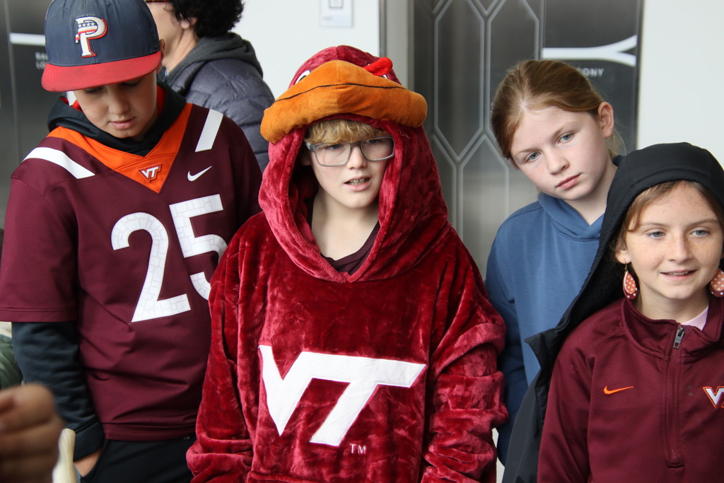 Four AES students at the Hokie for a day field trip