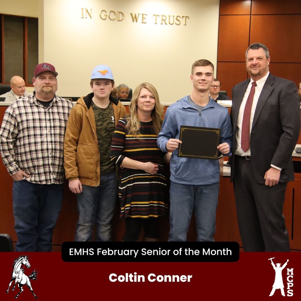 Coltin Conner standing with his family