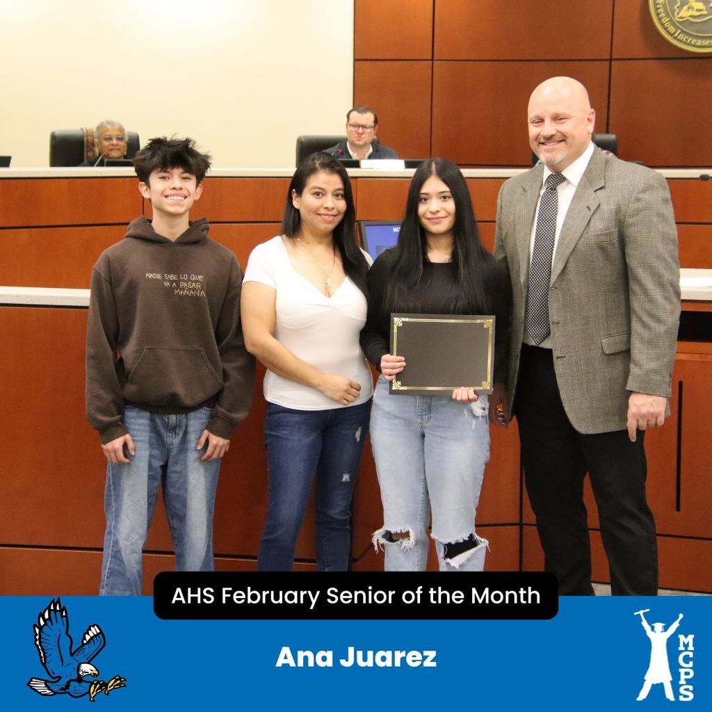 Ana Juarez standing with family