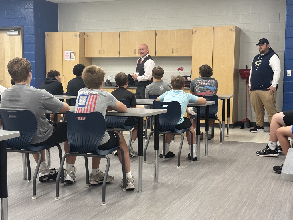 Dr. Guempel with the CHS Football team
