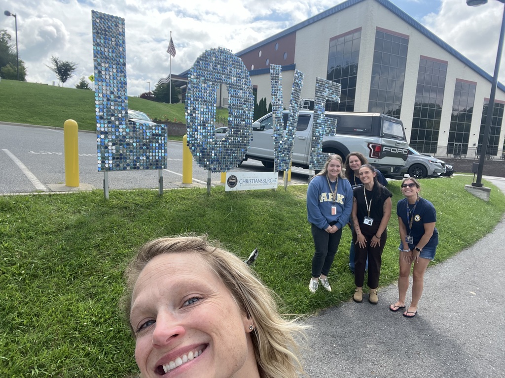 Five CES staff members pose outside the Christiansburg Recreation Center.
