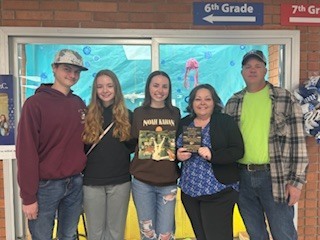 Mrs. River's family helped MCMS surprise her with a Wildcat Award.