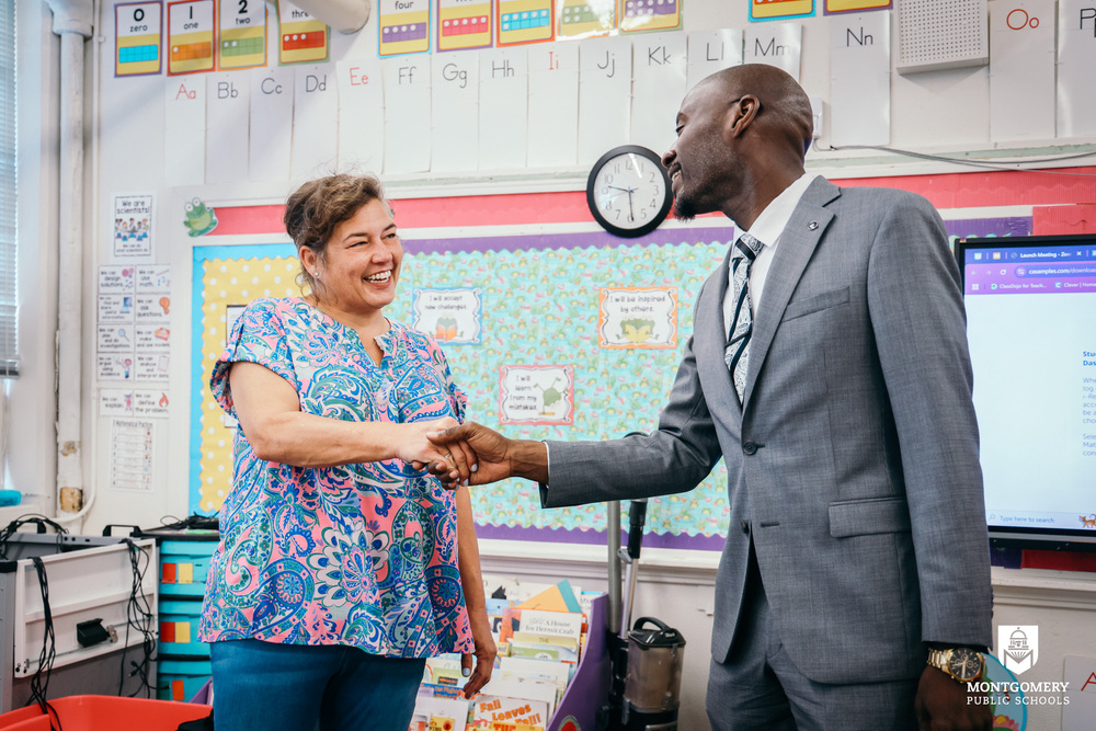 superintendent and teacher