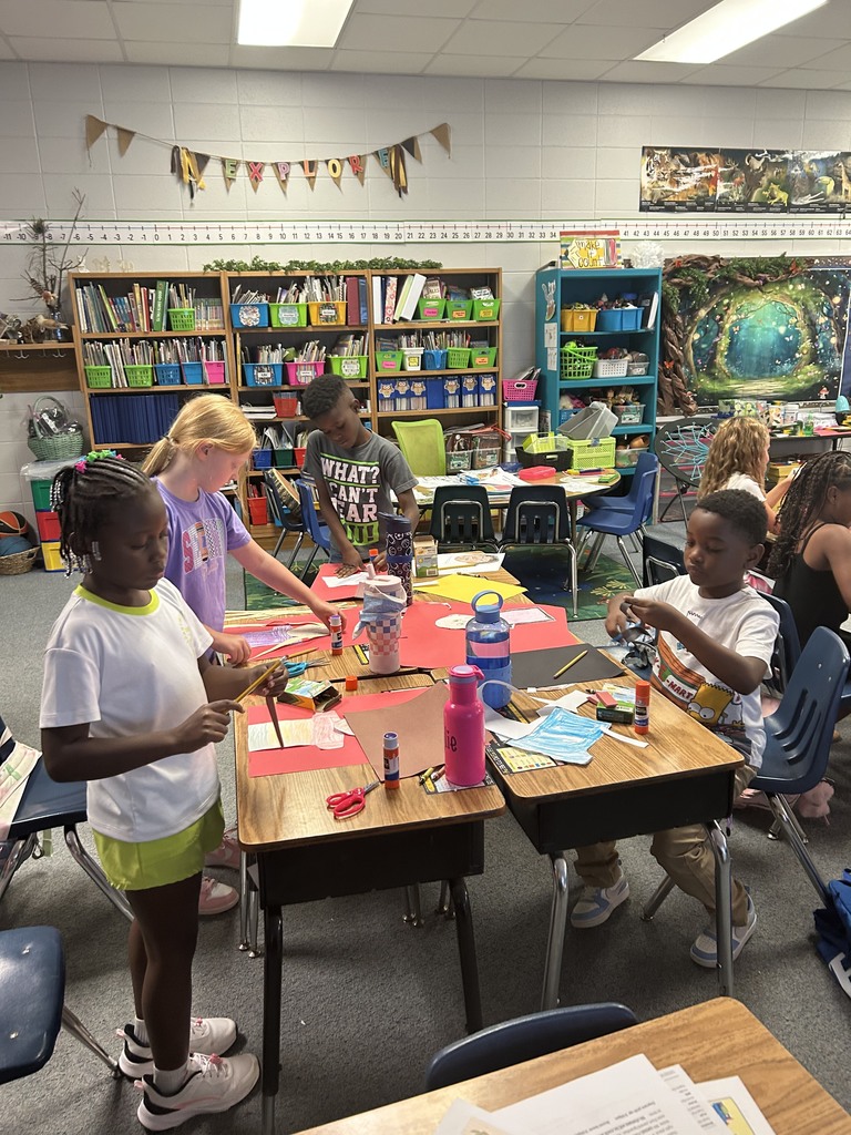 students playing games and looking at hedge hog