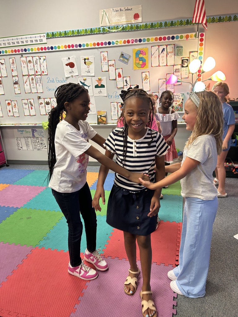 students playing games and looking at hedge hog