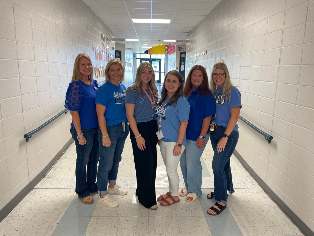 group of ladies standing together