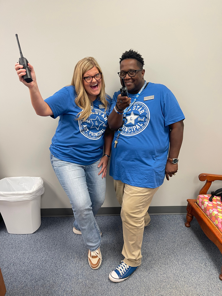 man and woman standing hold walkie-talkie 