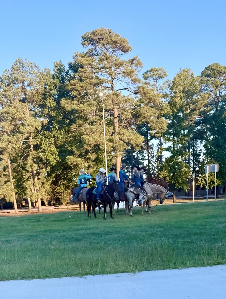 students on horseback