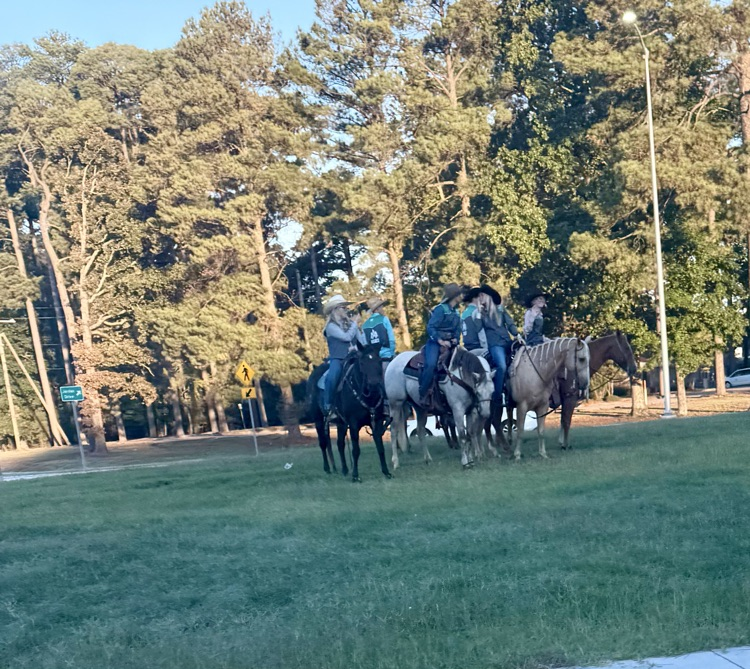 students on horseback