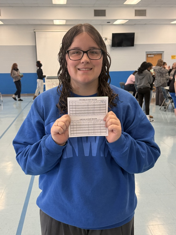 student with checkbook