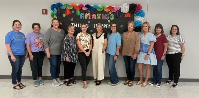 group of ladies standing together