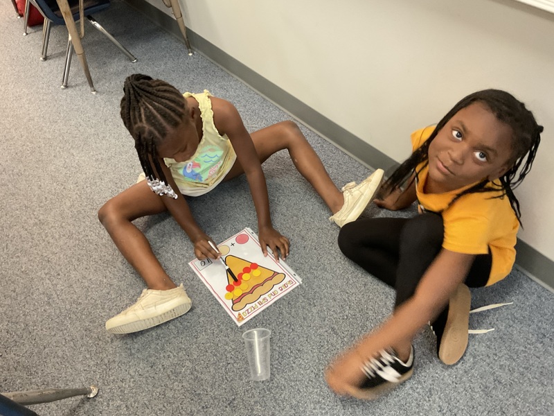 students on floor