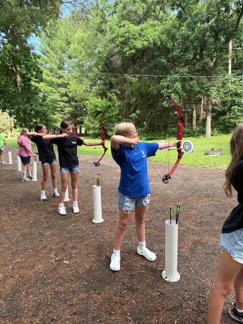 Students Shooting Arrows