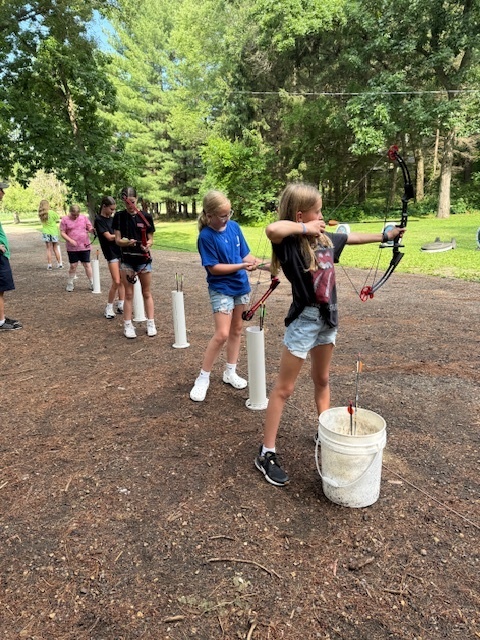 Students Shooting Arrows