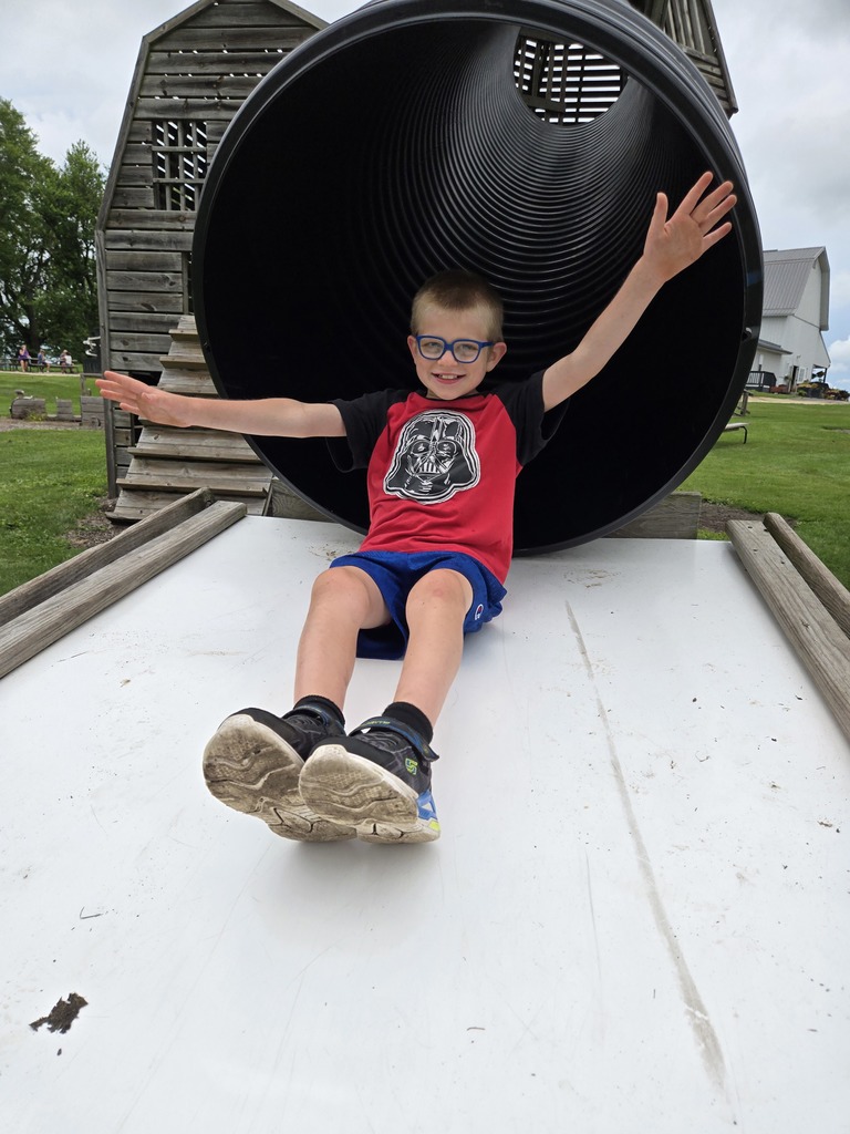 Student on a Slide