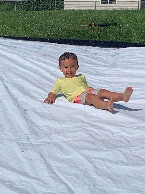 Student on Water Slide